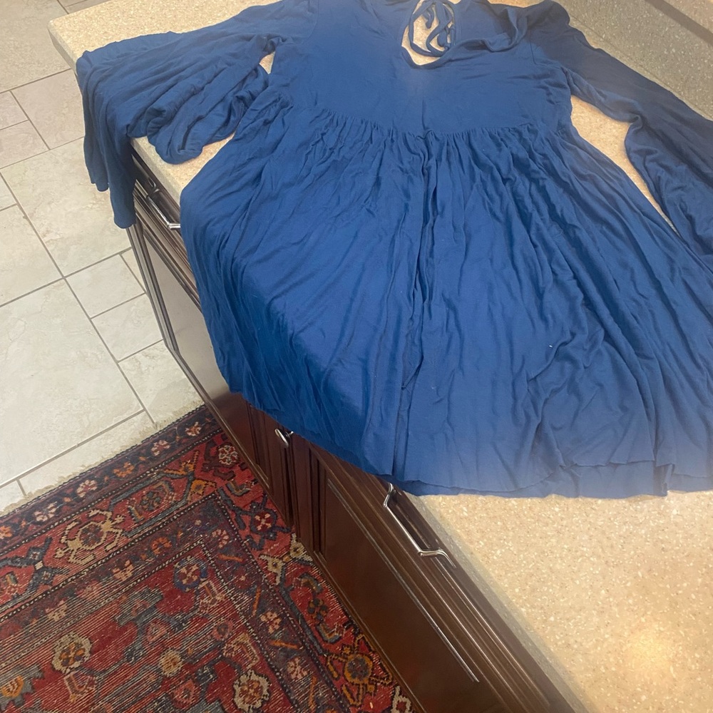 Lovely, flowing Free People size S.P. Blue mini dress. Long sleeved!